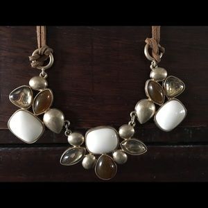 Brown, cream and tan on leather.